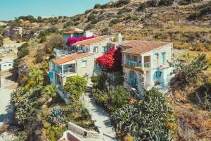 an aerial view of a house on a hill at Cyprus Villages Hotel & Restaurant - Central Location - Bed & Breakfast - With Access To Pool And Stunning Views in Tochni