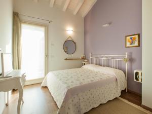 Posteľ alebo postele v izbe v ubytovaní B&B Cà Dea Calle