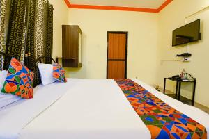 Postel nebo postele na pokoji v ubytování Via Joaquim Beachside Resort - Nr Tito's Lane, Baga Beach + 19 fotografií