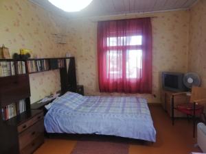 Postel nebo postele na pokoji v ubytování Kuberi guesthouse + 11 fotografií