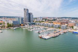 Výhľad na mesto Gdyňa alebo výhľad na mesto priamo z apartmánu