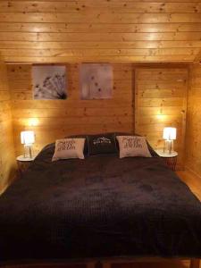 Postel nebo postele na pokoji v ubytování Chalet les Minés - Hautes Vosges