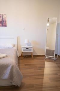 Postel nebo postele na pokoji v ubytování Comfortable Apartment Close to the Airport