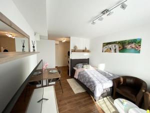 TV a/nebo společenská místnost v ubytování Aparthotel work&sleep