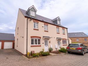 a house with a car parked in front of it at Shop & Stay at Bicester Village near our 3 Bed Home Pass the Keys in Bicester