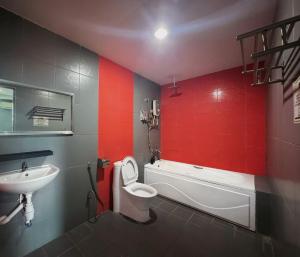 Koupelna v ubytování Metroinn Hotel