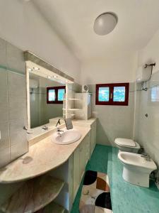 Koupelna v ubytování Chalet Del Bosco - Piccola Svizzera