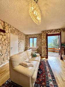 Posezení v ubytování Chalet Del Bosco - Piccola Svizzera