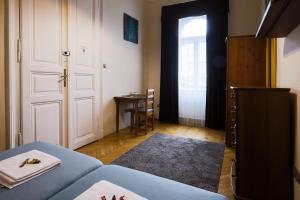 Posteľ alebo postele v izbe v ubytovaní East Private Rooms
