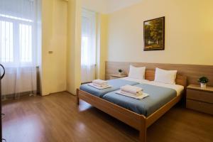 Posteľ alebo postele v izbe v ubytovaní East Private Rooms