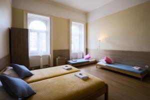 Posteľ alebo postele v izbe v ubytovaní East Private Rooms