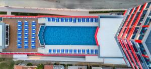 an aerial view of a building with a swimming pool at Granada Luxury Red Adult Only in Alanya