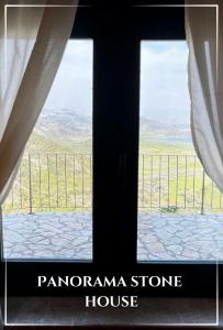 a view from a window of a house at Panorama Stone Houses - Skadar Lake in Cetinje