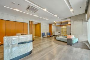 The Connor Serviced Residences Managed by HIIにあるシーティングエリア