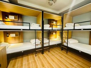 Voodi või voodid majutusasutuse Hanoi Central Backpackers Hostel toas