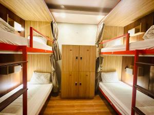 Voodi või voodid majutusasutuse Hanoi Central Backpackers Hostel toas