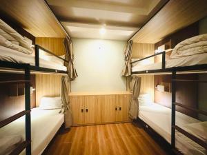 Voodi või voodid majutusasutuse Hanoi Central Backpackers Hostel toas