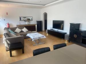 TV a/nebo společenská místnost v ubytování Villa Albufeira 1 à 6 personnes