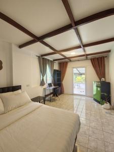 Letto o letti in una camera di Koh Mak Garden View