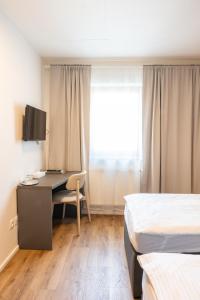Телевізор і / або розважальний центр в Hotel Sharingham