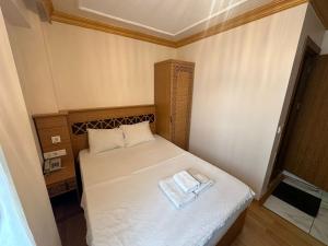 Postel nebo postele na pokoji v ubytování Delbab PANSİYON