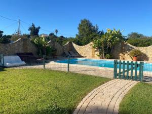 Bazén v ubytování Villa Albufeira 1 à 6 personnes nebo v jeho okolí