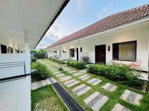 En hage utenfor Selong Holiday