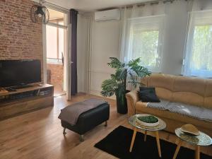 Televízia a/alebo spoločenská miestnosť v ubytovaní Apartman "Stay In" Osijek