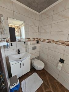 Baðherbergi á Prenociste Rooms Simke