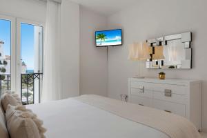 Posteľ alebo postele v izbe v ubytovaní Moderno y luminoso apartamento en Las Gaviotas- Puerto Banús