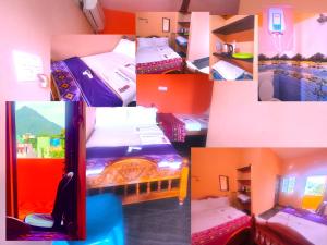 Postel nebo postele na pokoji v ubytování Pushpa Mahal A/C & Pushpa Residency