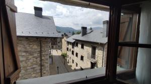 a view from a window of a castle at CHECK-IN CASAS Ramonot in Benasque
