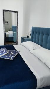 Letto o letti in una camera di 49 Downtown Pompeii
