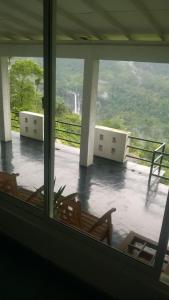 Balkón nebo terasa v ubytování Camellia Mountain Villa