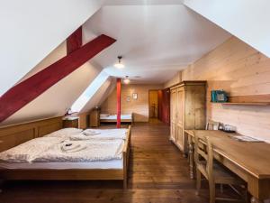 Postel nebo postele na pokoji v ubytování Pivovarský hotel