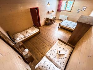 Postel nebo postele na pokoji v ubytování Pivovarský hotel