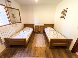 Postel nebo postele na pokoji v ubytování Pivovarský hotel