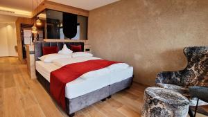 Postel nebo postele na pokoji v ubytování Hotel Bergland