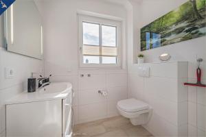 Ein Badezimmer in der Unterkunft Heimathafen An Seen & Meer