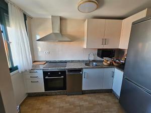 Una cocina o zona de cocina en Apartamento Nara Playa