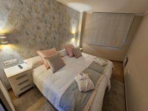 Cama o camas de una habitación en Apartamento Nara Playa