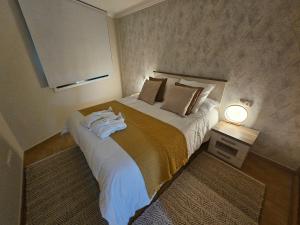 Cama o camas de una habitación en Apartamento Nara Playa