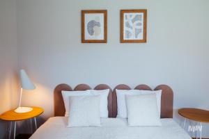 Posteľ alebo postele v izbe v ubytovaní Apartamenty Muzeum II Wojny Światowej
