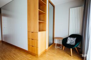 Posedenie v ubytovaní Apartamenty Muzeum II Wojny Światowej
