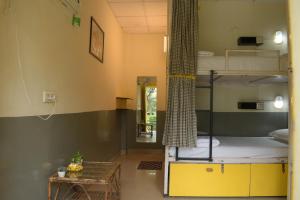 Letto o letti in una camera di Julley Commune Rishikesh