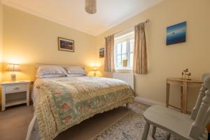 Ένα ή περισσότερα κρεβάτια σε δωμάτιο στο Hectors Hideaway