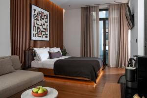 Ein Bett oder Betten in einem Zimmer der Unterkunft The Editor Hotel Athens