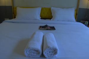 Letto o letti in una camera di Julley Commune Rishikesh