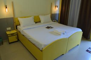 Letto o letti in una camera di Julley Commune Rishikesh