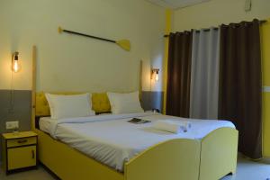 Letto o letti in una camera di Julley Commune Rishikesh
